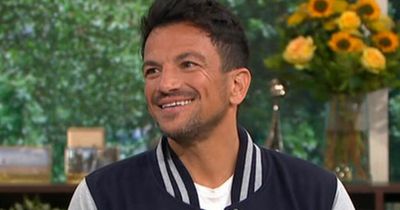 Peter Andre stunned as he's presented with cake of himself complete with sculpted abs