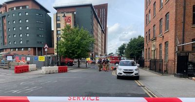 Street cordoned off and building evacuated after gas pipe damaged