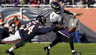 Robert Quinn on the field at Bears training camp