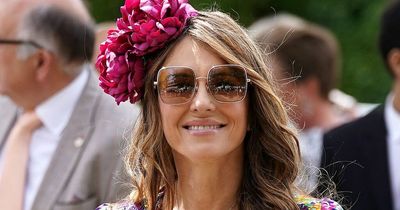 Liz Hurley stuns in plunging floral dress at Goodwood Festival with flirty male pal