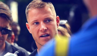 Panthers RB Christian McCaffrey collides with photographer in 1st training camp practice