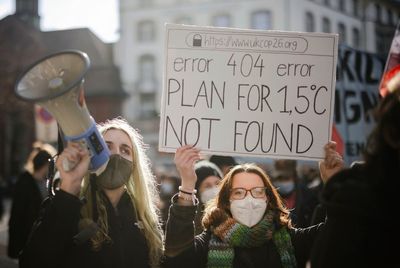Banks far from hitting Paris climate targets, groups warn