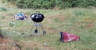Lit barbecue with burgers still cooking abandoned at beauty spot known as fire risk