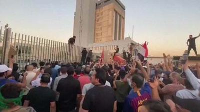 Protesters storm Iraqi parliament building to protest Prime Minister appointment