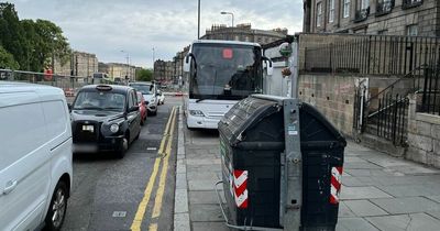 Edinburgh locals in disbelief after entire coach parks on city centre pavement