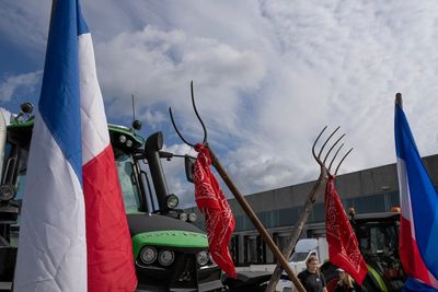 Cars hit tires dumped on Dutch highway amid farmer protests