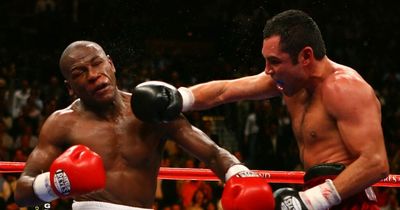 Oscar De La Hoya extends olive branch to Floyd Mayweather with NBA team offer