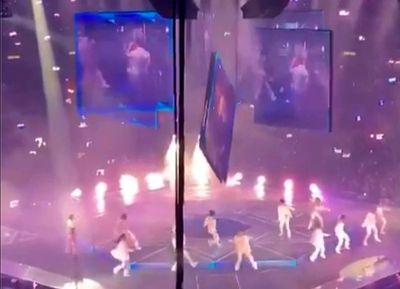 Falling screen hits 2 dancers on stage at Hong Kong concert