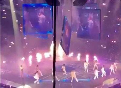 Giant screen falls and crushes dancers at concert by Hong Kong boy band Mirror