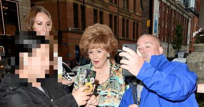 ITV Coronation Street legends Barbara Knox and Bill Roache mobbed as they attend soap's summer party