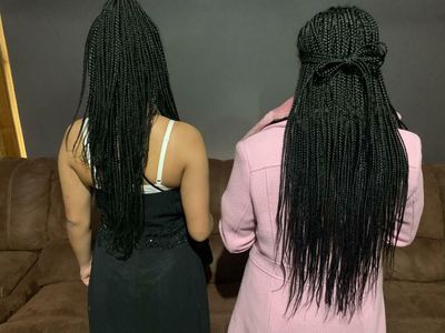 Sisters of African descent suspended from Victorian private school for not tying hair back