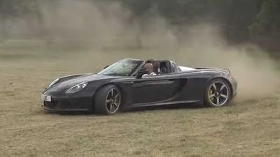 Porsche Carrera GT Dances On Grass Before BMW i3 Police Car Arrives