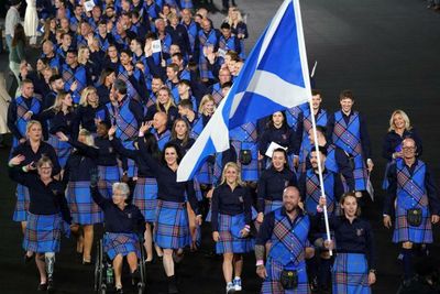 Team Scotland enter Commonwealth opening ceremony in vibrant tartan uniforms