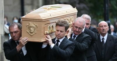 Declan Donnelly supported by Ant McPartlin at brother Father Dermott Donnelly's funeral