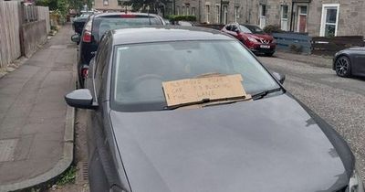 Furious neighbour leaves giant angry note on badly parked car in Scots street