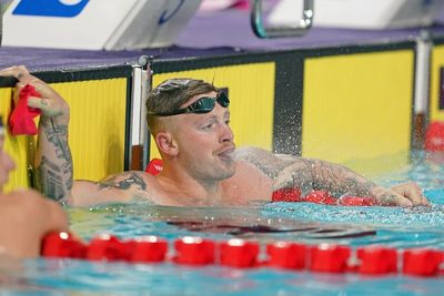 Adam Peaty cruises into 100m breaststroke semi-finals on injury return