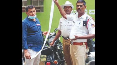 Bengaluru: Motorist with 58 cases uses fake number plate, lands in soup