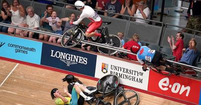 Commonwealth Games horror cycling crash sees race called off after fan injured by rider going over the barrier