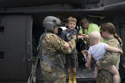 Rescuers face renewed rain as Kentucky flood death toll hits 26