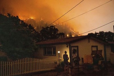 Windy, hot conditions fuel the explosive growth of fires in California and Montana