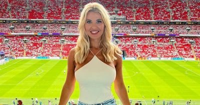 Christine McGuinness smiles as she steps out at women's Euro final after Paddy split