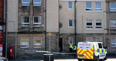Knife thug who cut man's throat released early from prison twice
