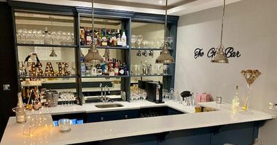 Mum creates basement bar in home after decorating every room from scratch