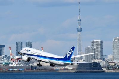 Japan's top airline ANA reports first net profit in 10 quarters