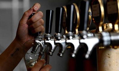 ‘$15 pint’: biggest tax hike in 30 years paints sobering future for Australia’s beer drinkers