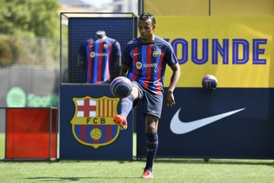 Kounde proud to join 'ambitious' Barcelona