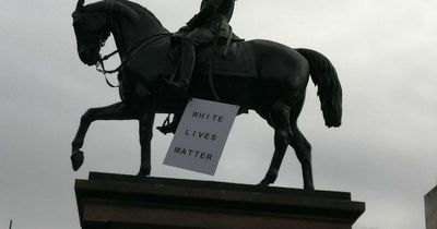 Glasgow statues targeted by 'racist' group leaving 'White Lives Matter' placards