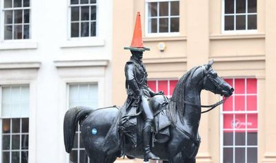 Fury as Glasgow statues targeted with 'racist' propaganda