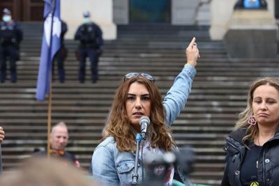 Australian senator raises fist and calls Queen 'colonialist' during oath