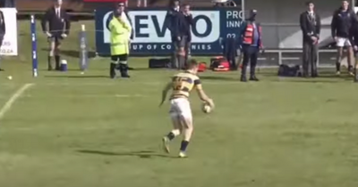 Crazy moment captured on video sees player kick rugby ball out in dying stages of match to lose the game