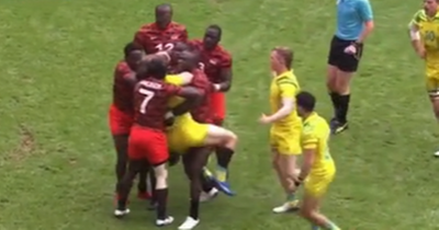 Bizarre rugby moment sees player dumped off field 'like a sack of spuds' as video watched by one million in 24 hours