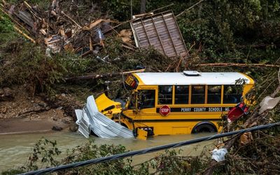 Bodies recovered as US faces worsening floods and fires