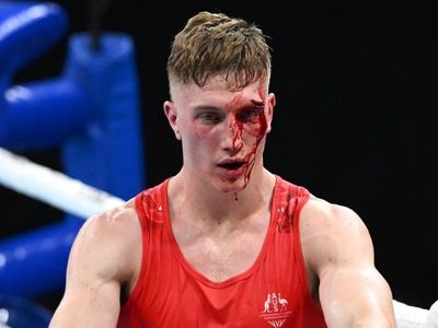 McAllister bloodied in Games boxing loss