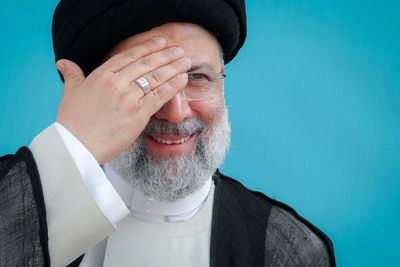 A year on, Iran's Raisi faces economy in trouble