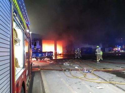 Fire crews tackle waste recycling factory fire in west London