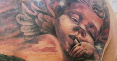 Dad has full back tattoo in honour of his children including five babies who sadly died