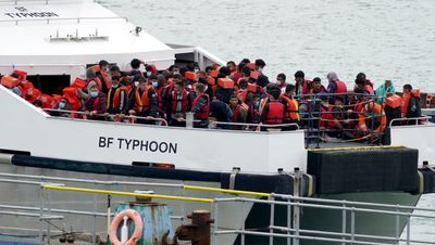 Nearly 700 migrants cross Channel in single day in record high for 2022
