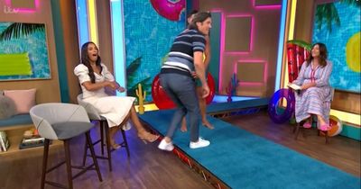 Vernon Kay pushes ITV Love Island's Jay off This Morning over body claims