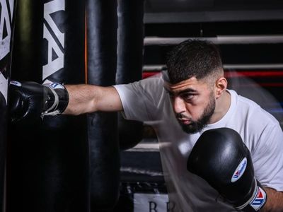 Ahmad relishes tough Games boxing debut