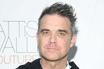 Robbie Williams trying to ‘embrace’ hair loss at 48 after failed transplant and follicle growth injections