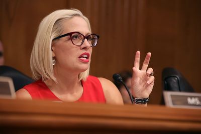 Koch ad asks Sinema to sink climate deal