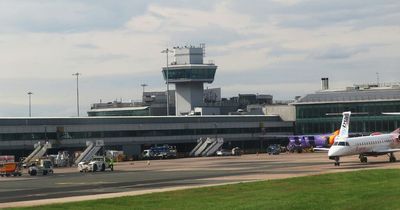 Emergency services called to Manchester Airport after baggage truck crashes