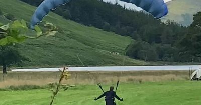 Dog walker having stroll in Lake District stunned as paragliding Tom Cruise lands next to her
