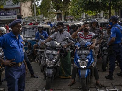 In Sri Lanka, inflation means food shortages, blackouts — and days-long lines for gas