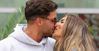 ITV Love Island winners Ekin-Su and Davide can't keep their hands off each other as they land back in UK