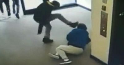 Elderly woman kicked and beaten in savage gang attack outside flat